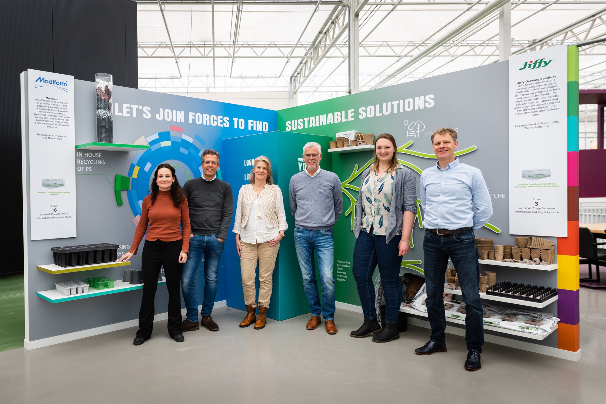 An image showcasing Thorleif Hals, CEO of Jiffy Group, with a smile, standing beside an indoor agriculture production of lettuce. A white message overlay reads, "An Exclusive Interview with Thorleif Hals, CEO of Jiffy Group, for Newsweek Magazine."